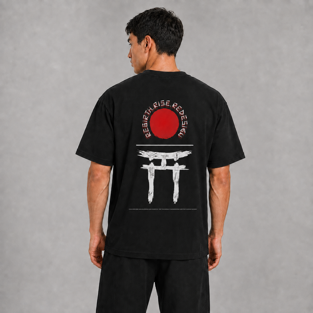 Back view of a model wearing the black Gate of Becoming T-shirt with red sun and torii gate artwork