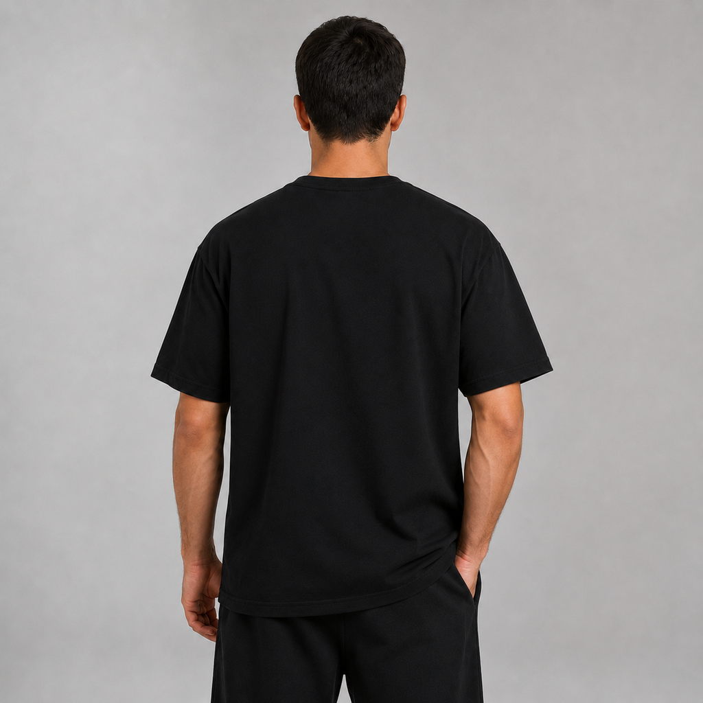 1. Back view of a model wearing the black Kitsune Spirit T-shirt